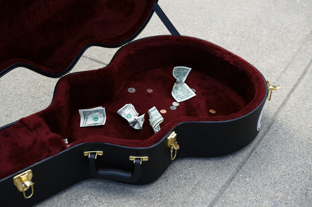 Guitar case with cash